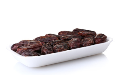 delicious dried dates in packaging isolated on white