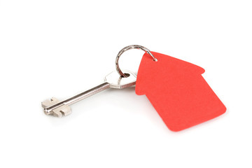 Key with house-shaped charm isolated on white