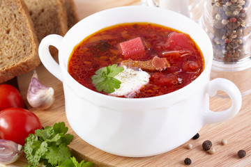 Russian cuisine. Borsch in a white tureen
