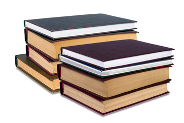 Stacks of books on a white background.