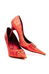 Red female shoes in fashion concept