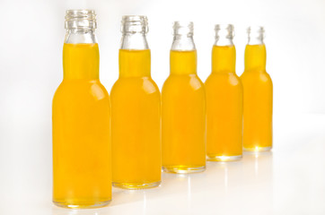 bottled orange juice in bottles