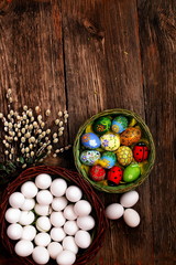 Easter eggs and  natural wooden country table