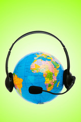 Headset on globe isolated on the white