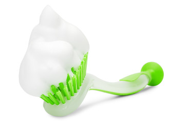 green cleaning brush with white foam