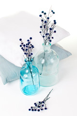 vintage glass bottles and pillows