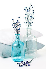 vintage glass bottles and pillows