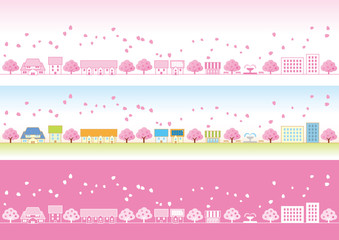 桜の花びらが舞う春の町