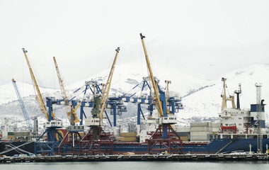 Fototapeta na wymiar Large gantry cranes at the port of Novorossiysk, Russia