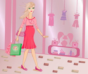 pregnant woman shopping for her soon to be born baby