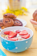Breakfast with fresh muesli and orange juice