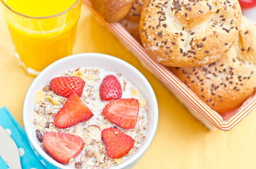 Breakfast with fresh muesli and orange juice