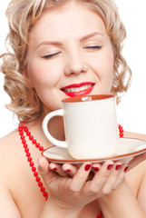 blonde woman with cup