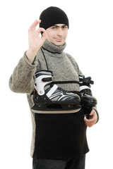 Men with skates gesture shows okay on white background.