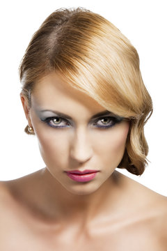 blond vintage girl portrait, she has an actractive eyes