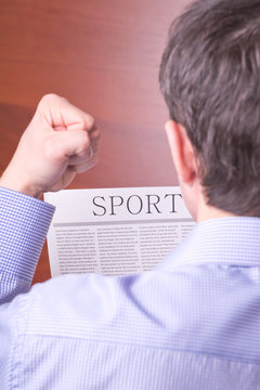 Man reading a newspaper