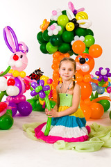 Obraz na płótnie Canvas Beautiful little girl in balloon forest