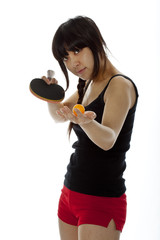 Young Asian woman with a ping-pong racket and ball
