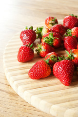 Strawberries on a chopping board