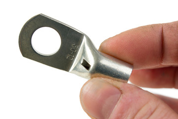 Crimp terminal ring for heavy electric cable in handd on white
