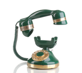 Retro phone with floating handset isolated on white