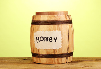 Sweet honey in barrel with drizzler