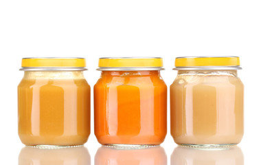 Jars of baby puree isolated on white