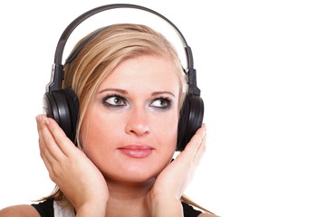 Fototapeta premium Woman with headphones listening to music isolated white backgrou