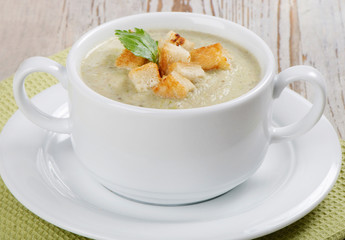 Creamy soup with croutons