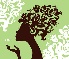 Beautiful woman silhouette with a flowers