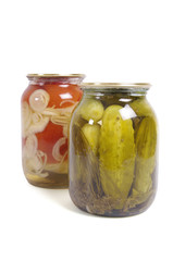 Pickled cucumber and tomato in glass