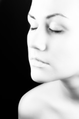 Fototapeta premium Black and white photo of a young woman