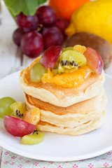 Pancakes with fruit salad