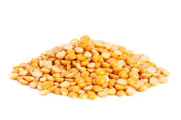 Pile split yellow peas isolated on white background.