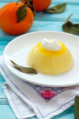 Orange panna cotta dessert with saffron