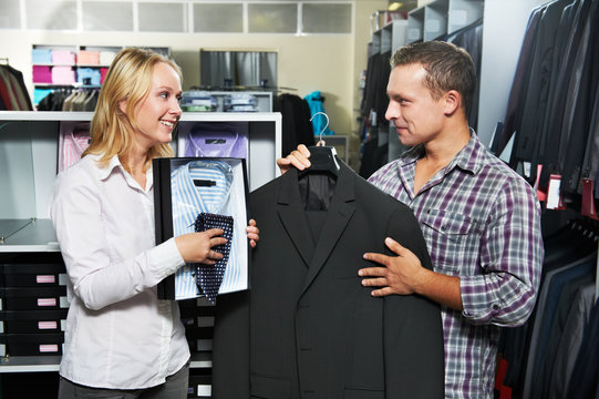 Young couple at clothes shopping