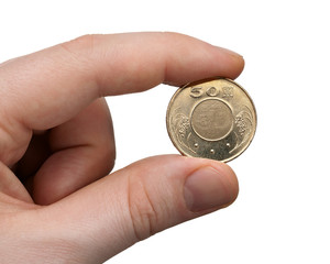 Holding a 50 NT Dollar Coin