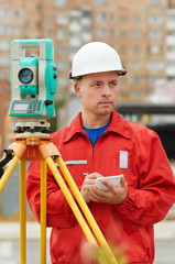 surveyor works with theodolite