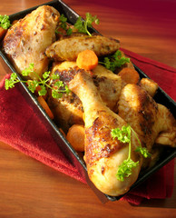 Tasty roasted chicken with vegetable and herbs