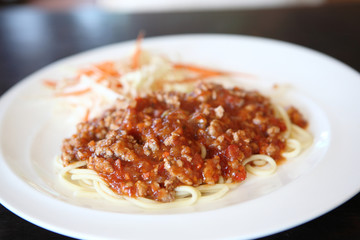 spaghetti with pork in tomato sauce