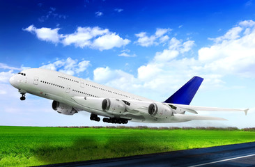 Fototapeta na wymiar Modern airplane in Airport. Take off on runway.