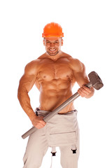 young and handsome construction worker with a sledgehammer