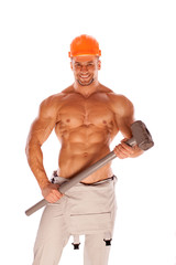 young and handsome construction worker with a sledgehammer