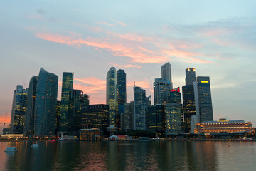 Fototapeta na wymiar Reflections of CBD's skyscrapers at Singapore