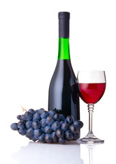 Bottle of wine with grape and glass isolated