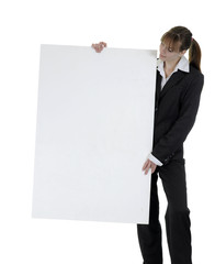Business woman looks at a canvas