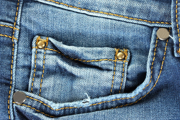 blue jeans pocket closeup.