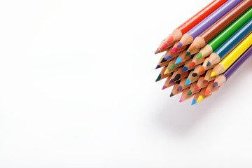 Colored pencils on a white background.