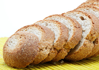 Fresh bread on a bamboo napkin.