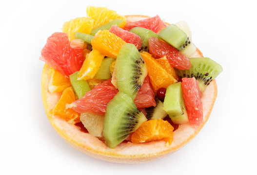 Fresh fruits salad on white background